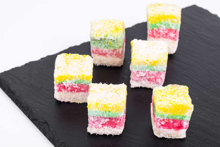 Eastern sweets Turkish delight in color coconut chipsの写真素材