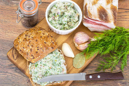 Appetizer of chopped bacon with garlic and herbsの写真素材