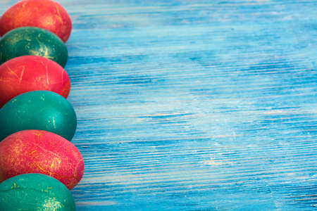 Abstraction painted Easter eggs on a blue background. Studio Photoの写真素材