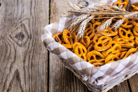Pretzels traditional German pastries on a wooden backgroundの写真素材