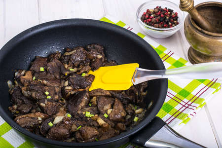 Fried wild mushrooms with onion in panの写真素材