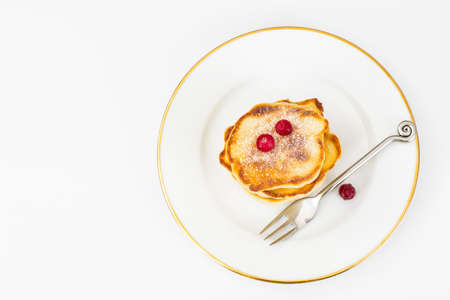 Delicious pancakes with berries and yogurt.の写真素材