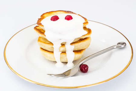 Delicious pancakes with berries and yogurt.の写真素材