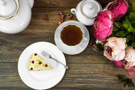 Piece of sponge cake with berries and creamの写真素材