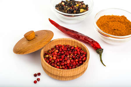 Spicy Spice Pink pepper peas on white background
