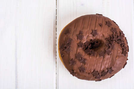 Donut with chocolate icing and espressoの写真素材