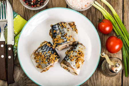 Baked mackerel with mustard seedsの写真素材