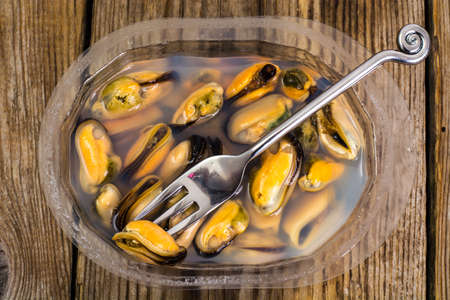 Marinated mussels in brine. Studio Food Photoの写真素材