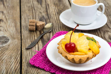 Cake with cream and fruit in jellyの写真素材