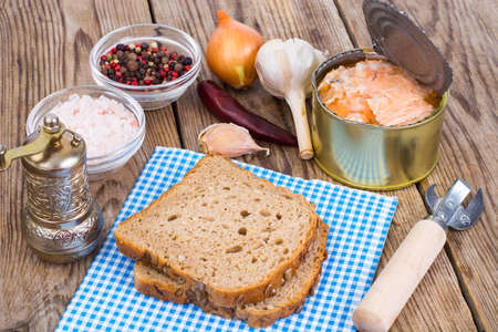 Canned fish salmon or tuna in open metal canの写真素材