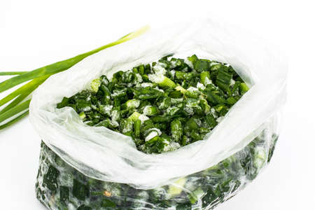 Onions green sliced frozen in plastic bag. Studio Photoの写真素材