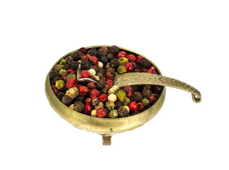 Peas of colored pepper in metalの写真素材