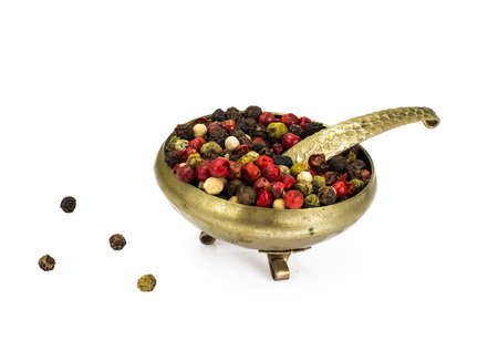 Peas of colored pepper in metalの写真素材