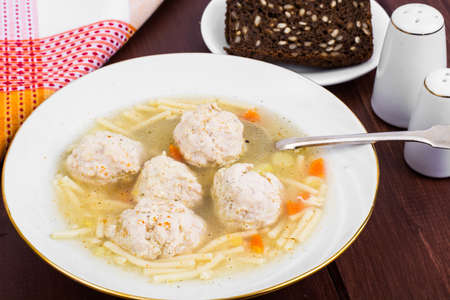 Soup with meatballs in plateの写真素材