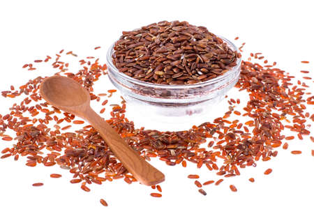 Red rice isolated on white backgroundの写真素材
