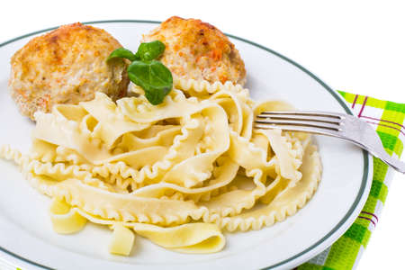 Pasta with cutlets for lunchの写真素材