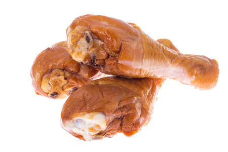 Smoked chicken drumstick on white background. Studio Photoの写真素材