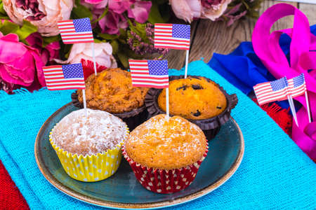 American independence day, celebration, patriotism  concept - muffins, decorated with flag  for 4th july party. Studio Photoの写真素材