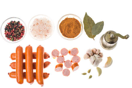 Small smoked sausages on white background.の写真素材