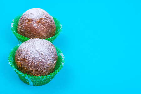 Sweet rum truffle cake on pastel background.
