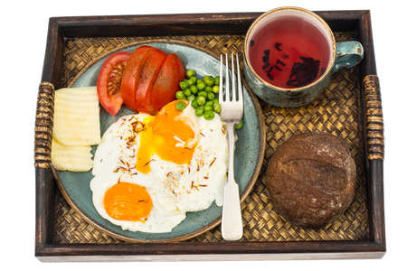 Breakfast. Wooden tray with dishesの写真素材