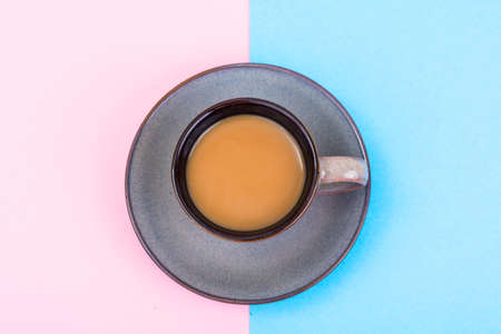 Cup of coffee with milk on pastel background. Studio Photoの写真素材