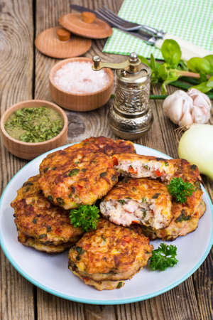 Vegetable pancakes with chicken meatの写真素材