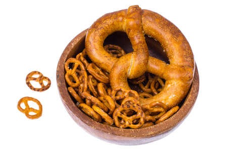 Beer in mug and salted bretzels as an appetizerの写真素材