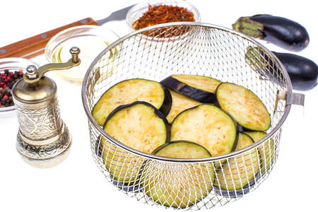 Round slices of eggplant on white background. Studio Photoの写真素材
