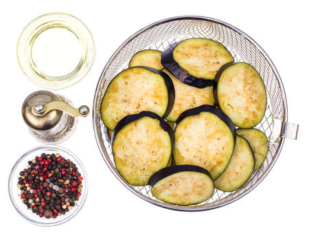 Round slices of eggplant on white background. Studio Photoの写真素材