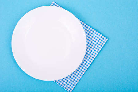 Bright pastel background with plateの写真素材