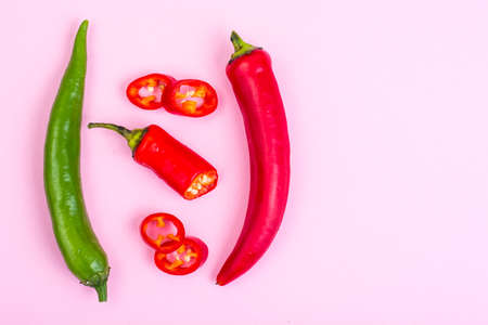 Chili peppers on pastel bright backgroundの写真素材