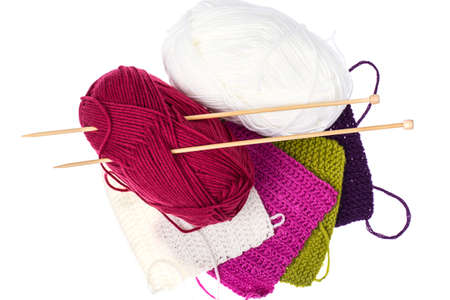 Skeins of thread and knitting wooden needles for needlework