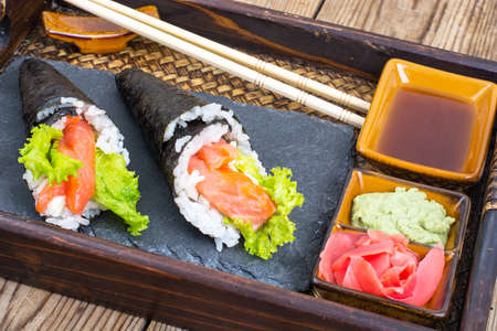 Salmon temaki sushi cone on the tray. Studio Photoの写真素材