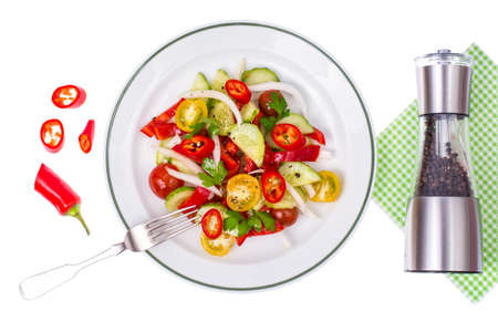 White dish with fresh vegetable saladの写真素材