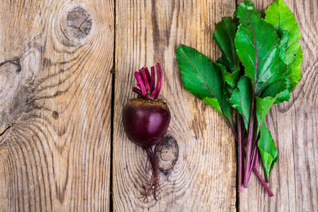 Beetroot on old wooden tableの写真素材