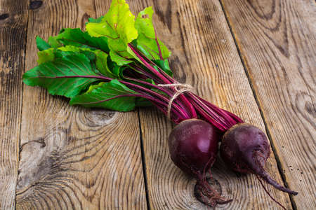 Beetroot on old wooden tableの写真素材