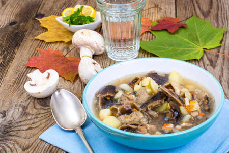 Delicious homemade soup with mushrooms and potatoesの写真素材