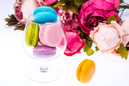 Delicate delightful delicious colored macaroons on white backgroundの写真素材
