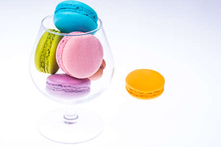 Delicate delightful delicious colored macaroons on white backgroundの写真素材