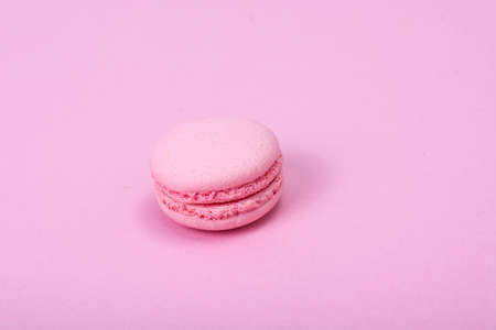 Small French macaroons on pastel backgroundの写真素材