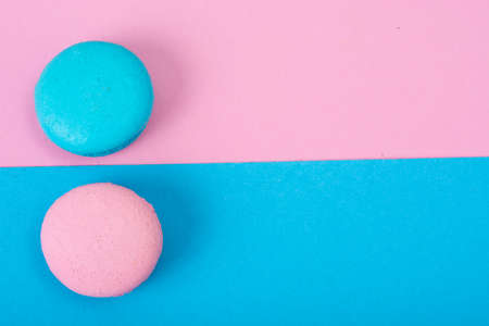 Small French macaroons on pastel backgroundの写真素材