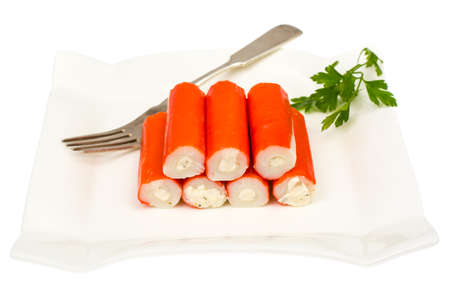 Surimi crab sticks on white plateの写真素材
