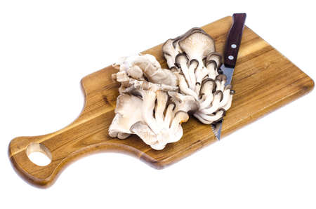 Fresh mushrooms on the kitchen cutting
