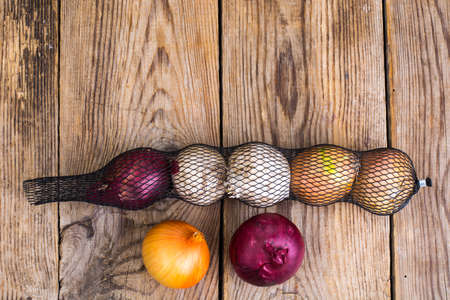 Onion in net for storageの写真素材