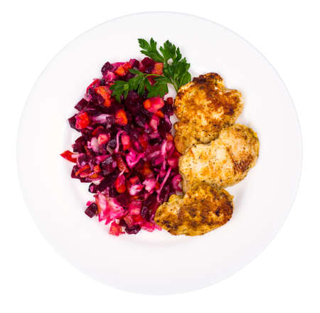 Plate with beetroot salad and grilled chicken fillet. Studio Photoの写真素材
