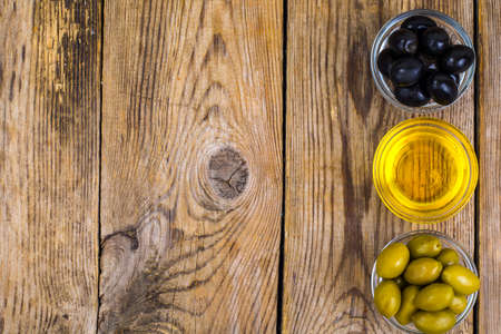 Olives with olive oilの写真素材