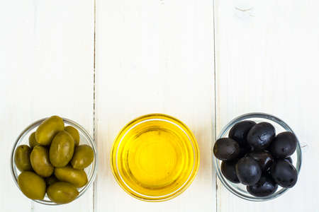 Olives with olive oilの写真素材