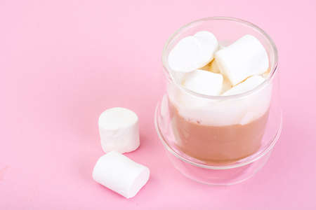 White marshmallow on pink backgroundの写真素材