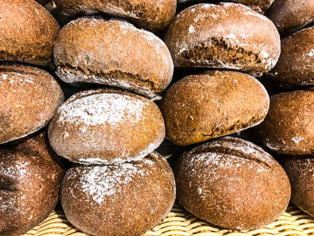 Whole-wheat rye rolls in bread basket. Studio Photoの写真素材